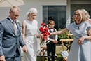 bride and groom walking down the aisle together 