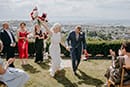 Bride and groom happily walking as newly weds- Nelson Wedding