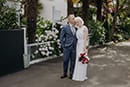 Bride and groom lovingly standing- Nelson Wedding