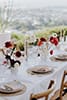 vibrant red touches of wedding table setting- Nelson Wedding