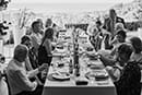 black and white shot of guests talking and having fun at their wedding party- Nelson Wedding